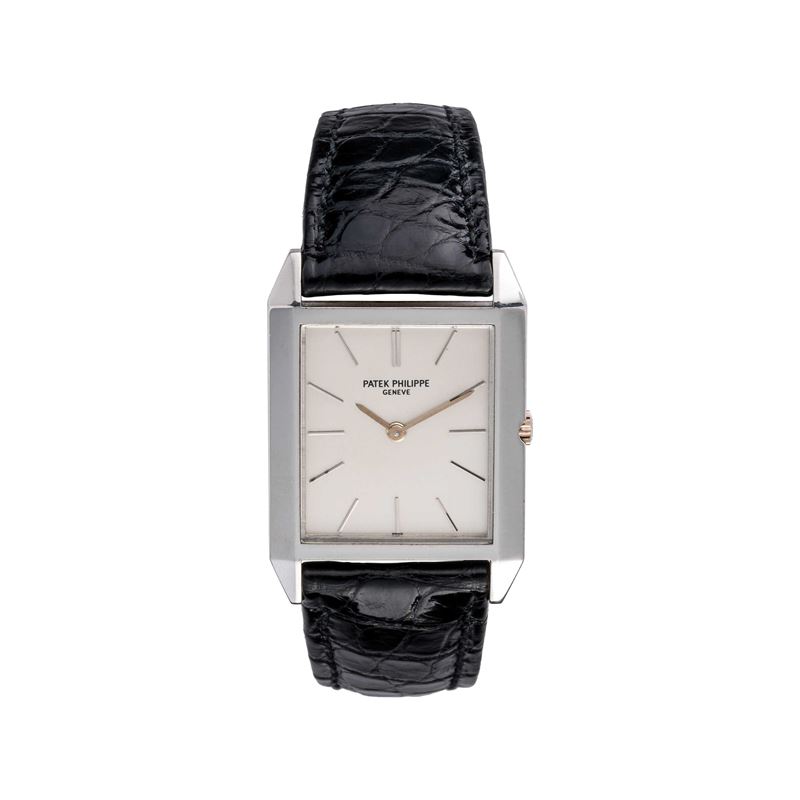 PATEK PHILIPPE - TANKOROLOGIO A CARICA MANUALE IN ORO BIANCO 18KT CON ESTRATTO D'ARCHIVIO.