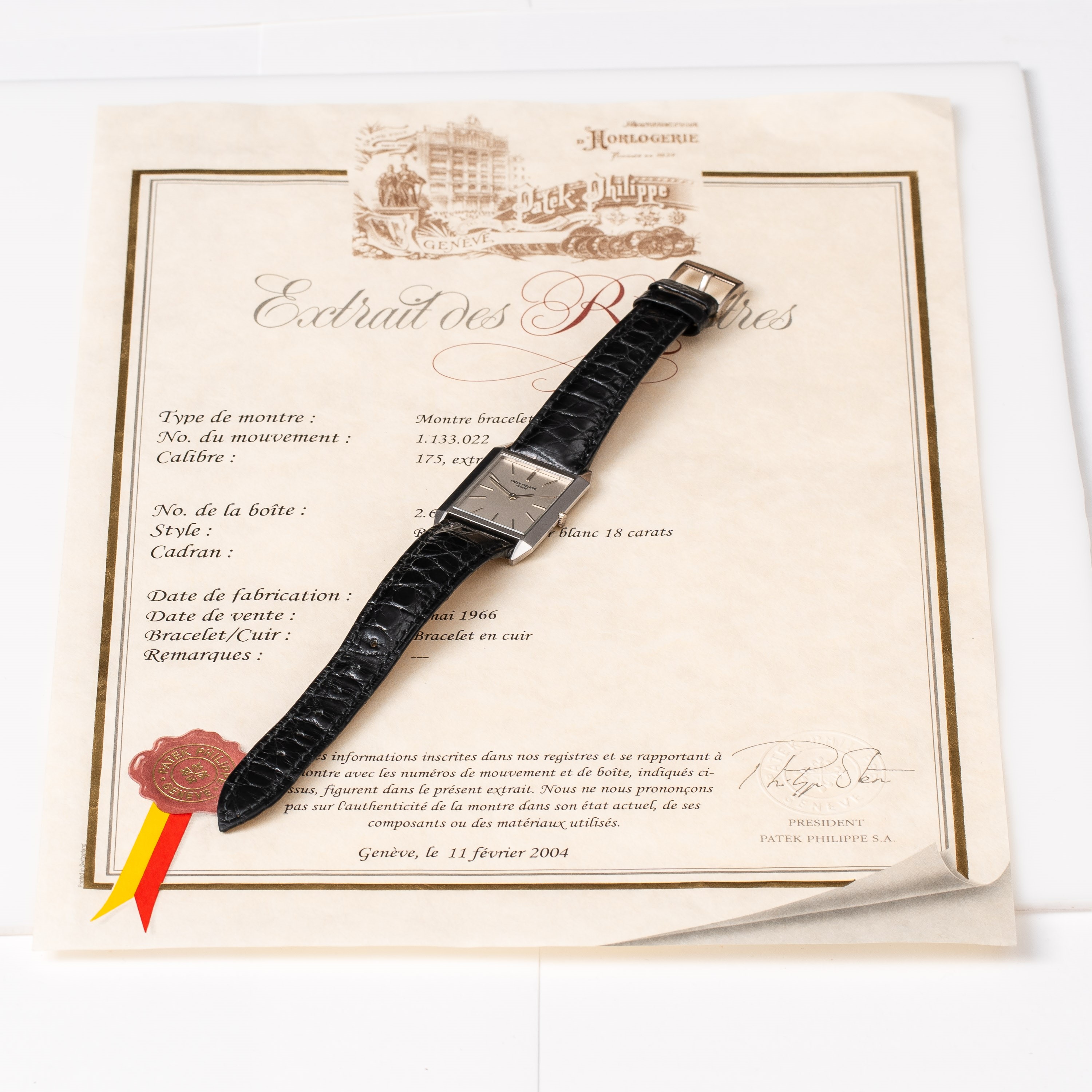 PATEK PHILIPPE - TANKOROLOGIO A CARICA MANUALE IN ORO BIANCO 18KT CON ESTRATTO D'ARCHIVIO.