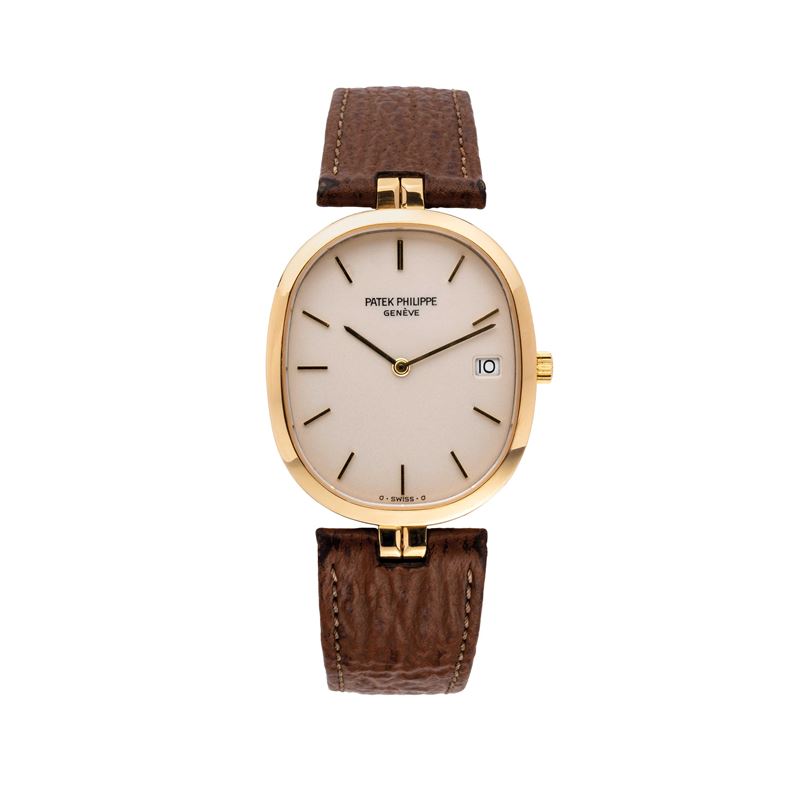 PATEK PHILIPPE - ELLIPSEOROLOGIO SOLO TEMPO AL QUARZO IN ORO GIALLO 18KT CON DATARIO AD ORE TRE.