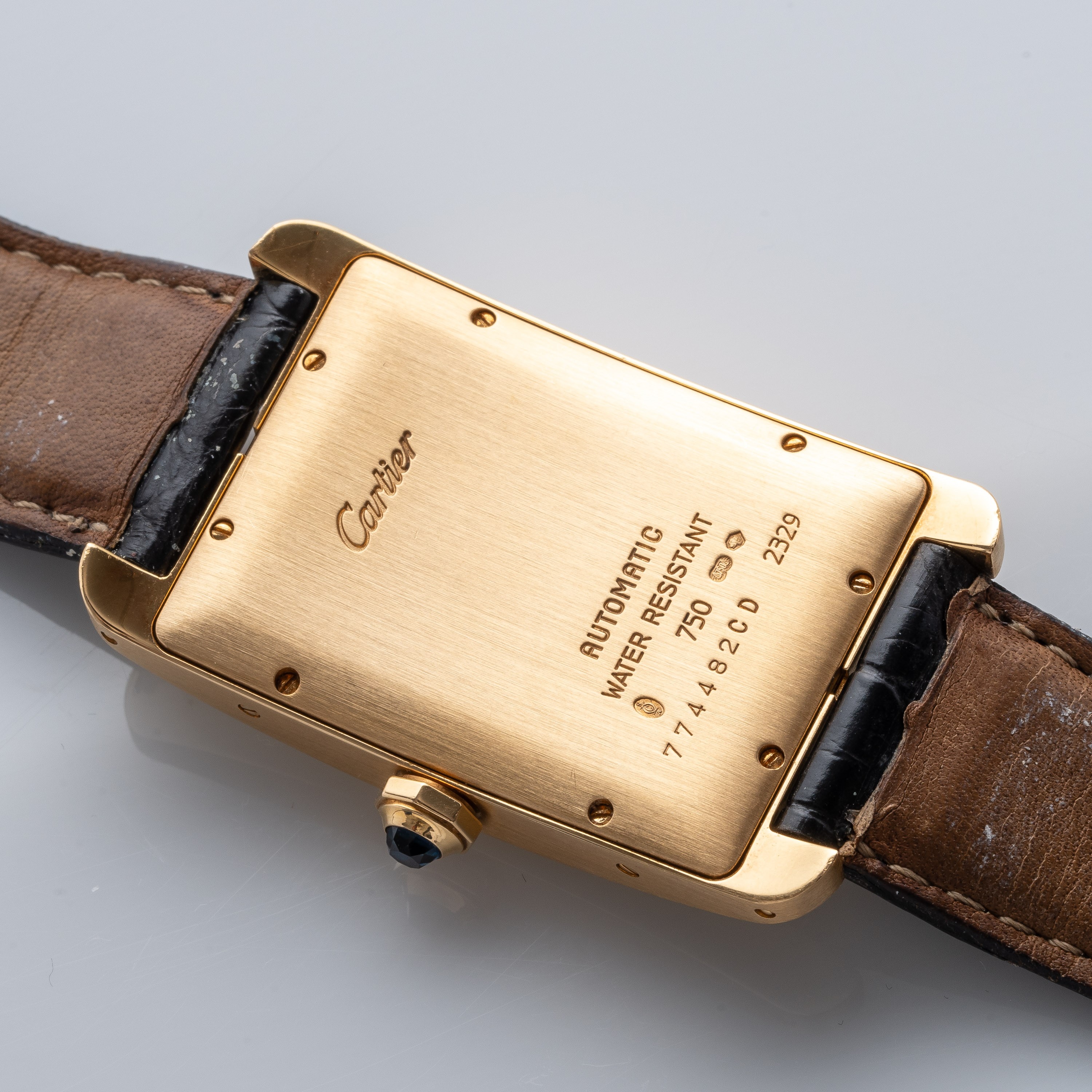 CARTIER - TANK AMERICAINEOROLOGIO A CARICA AUTOMATICA IN ORO GIALLO 18KT, QUADRANTE BIANCO E DATA...