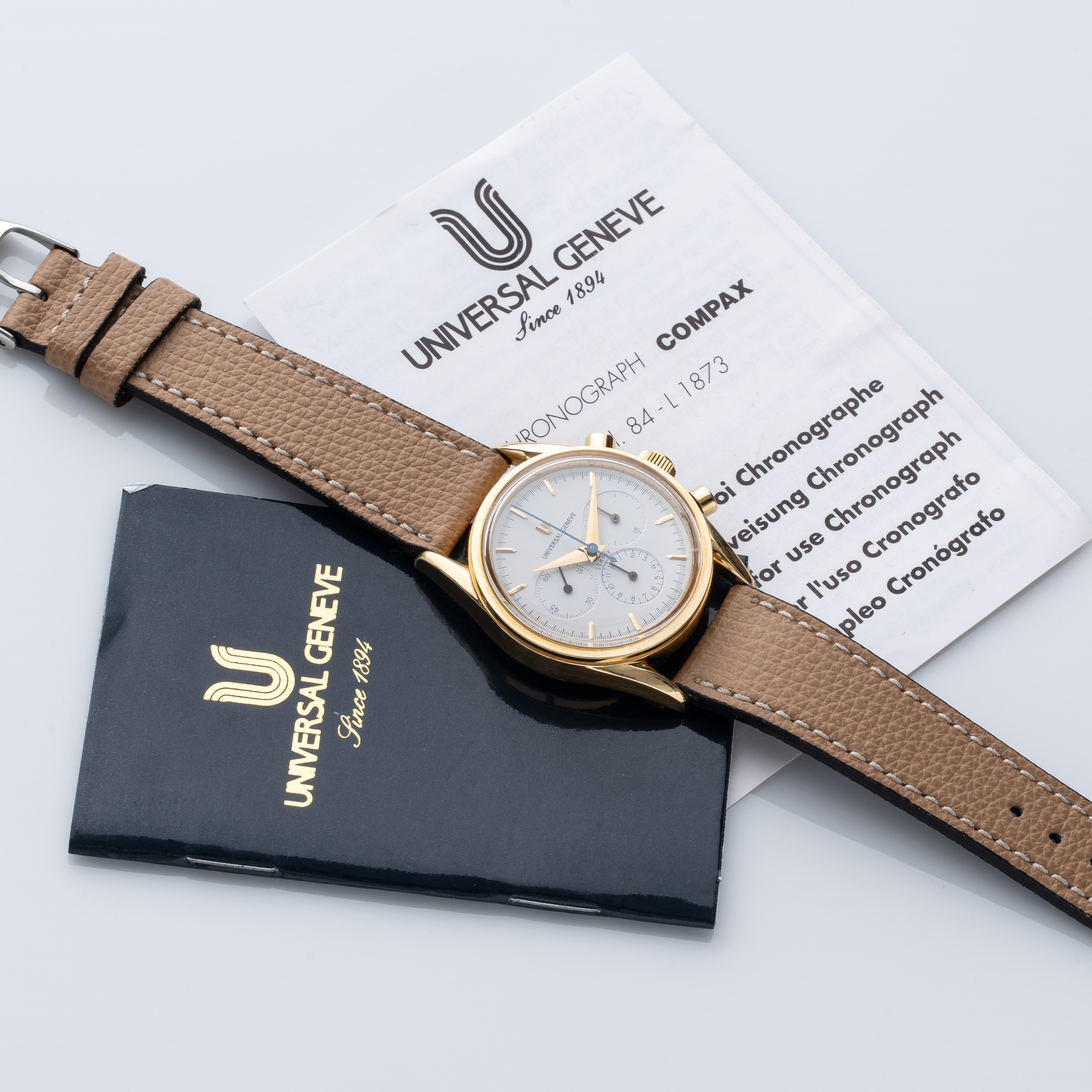 UNIVERSAL GENEVE - COMPAXCRONOGRAFO MANUALE IN ORO GIALLO 18KT CON QUADRANTE BIANCO A TRE CONTATO...