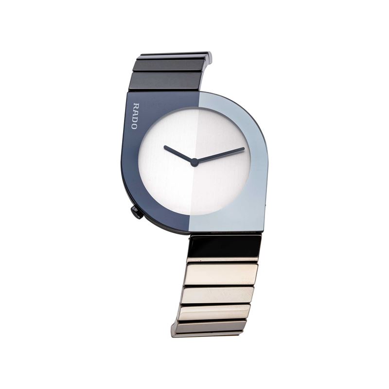 RADO - ASIMMETRICOOROLOGIO AL QUARZO CON CASSA ASIMMETRICA IN CERAMICA E QUADRANTE BITONALE.