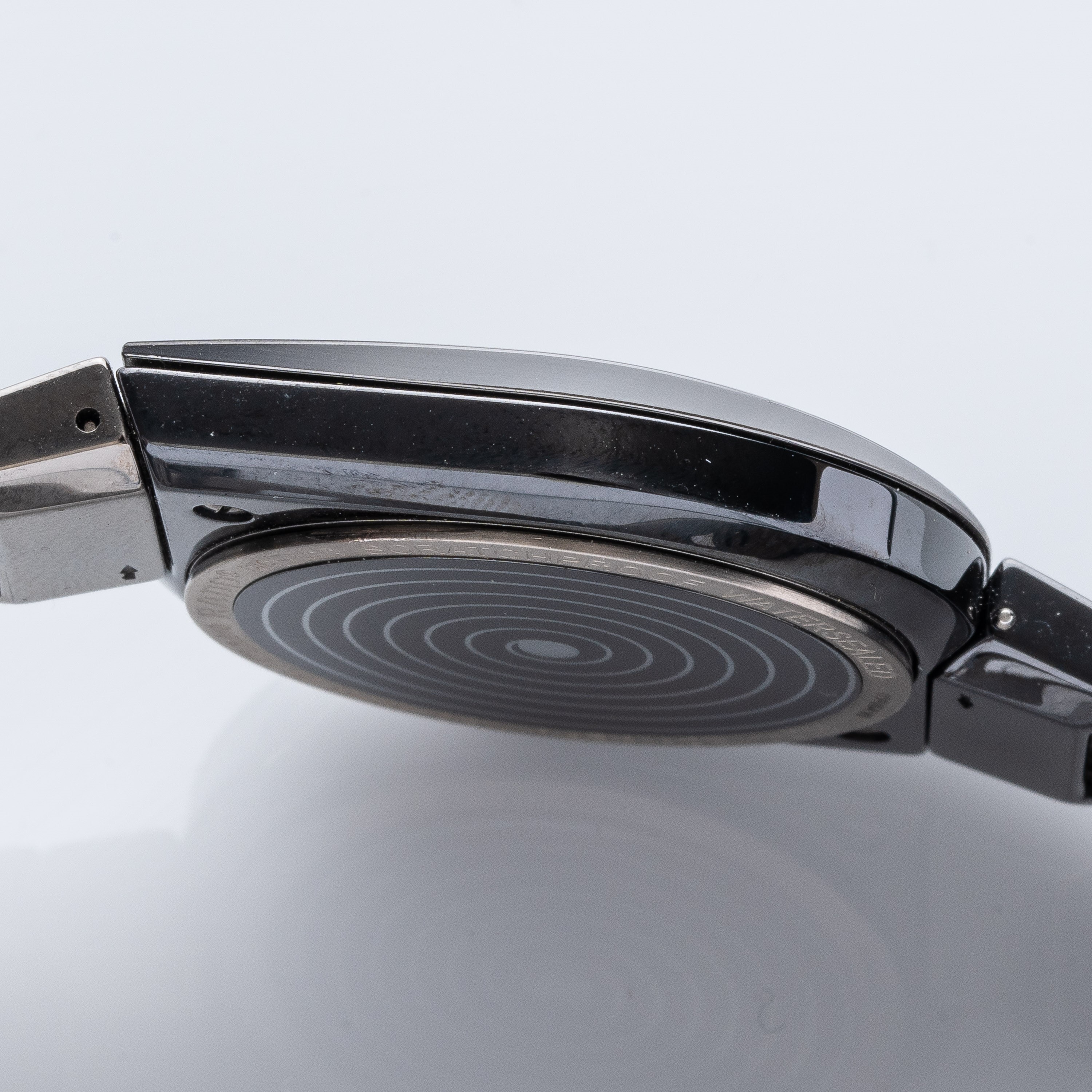 RADO - ASIMMETRICOOROLOGIO AL QUARZO CON CASSA ASIMMETRICA IN CERAMICA E QUADRANTE BITONALE.