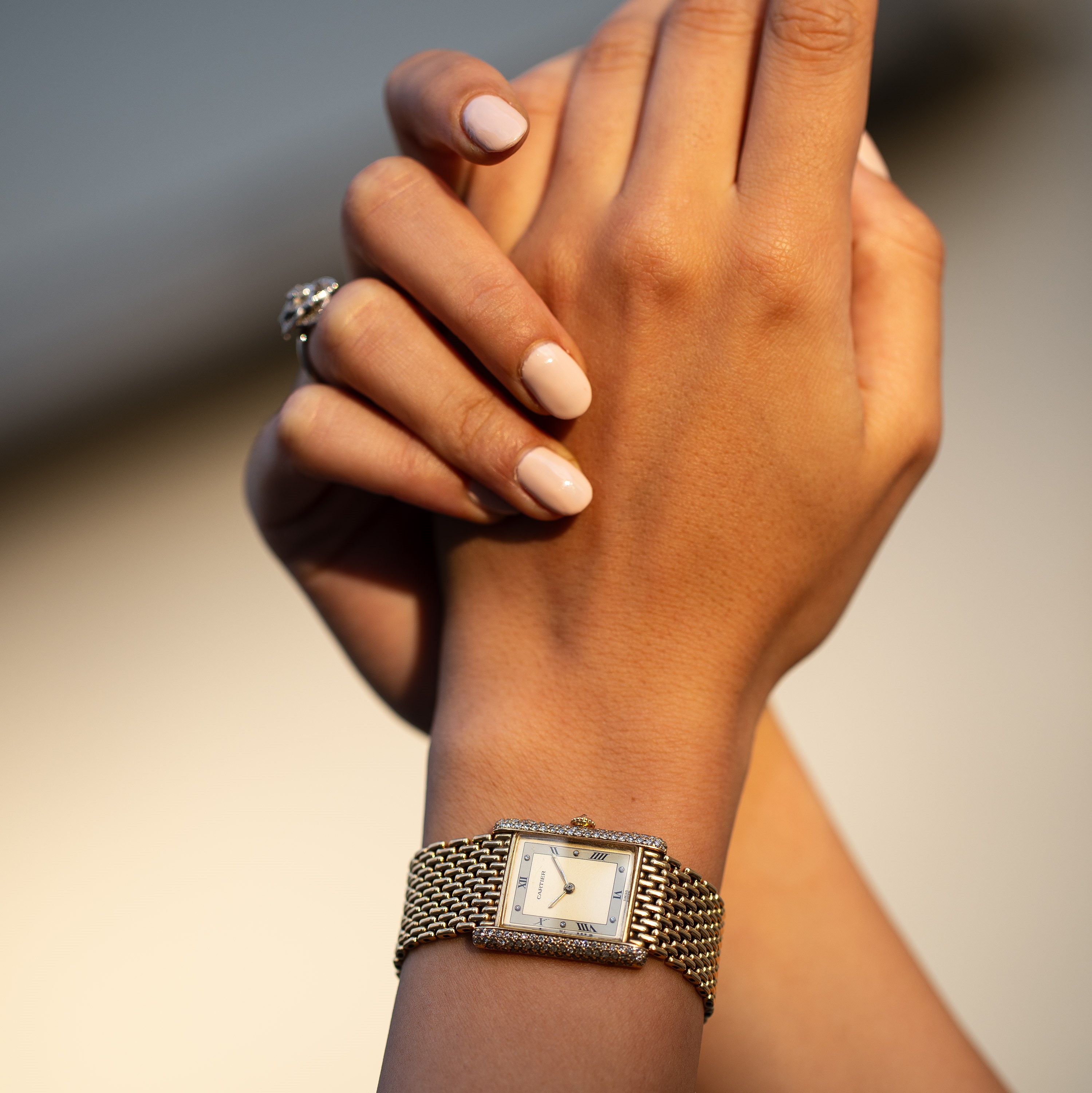 CARTIER - TANKOROLOGIO A CARICA MANUALE IN ORO GIALLO 18KT CON BRILLANTI E BRACCIALE IN ORO.