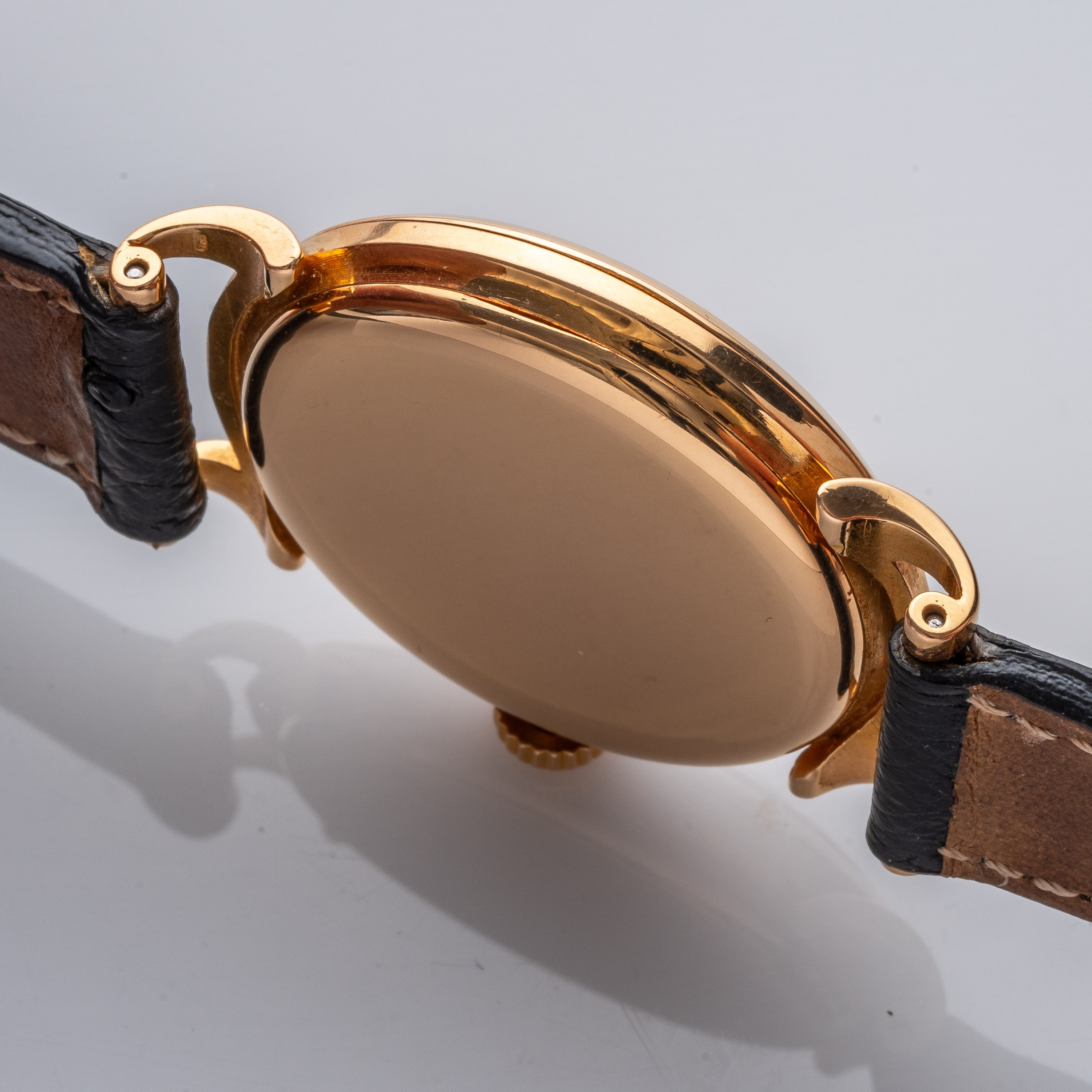 PATEK PHILIPPE - CALATRAVAOROLOGIO A CARICA MANUALE IN ORO ROSA 18KT CON ANSE A RICCIOLO.