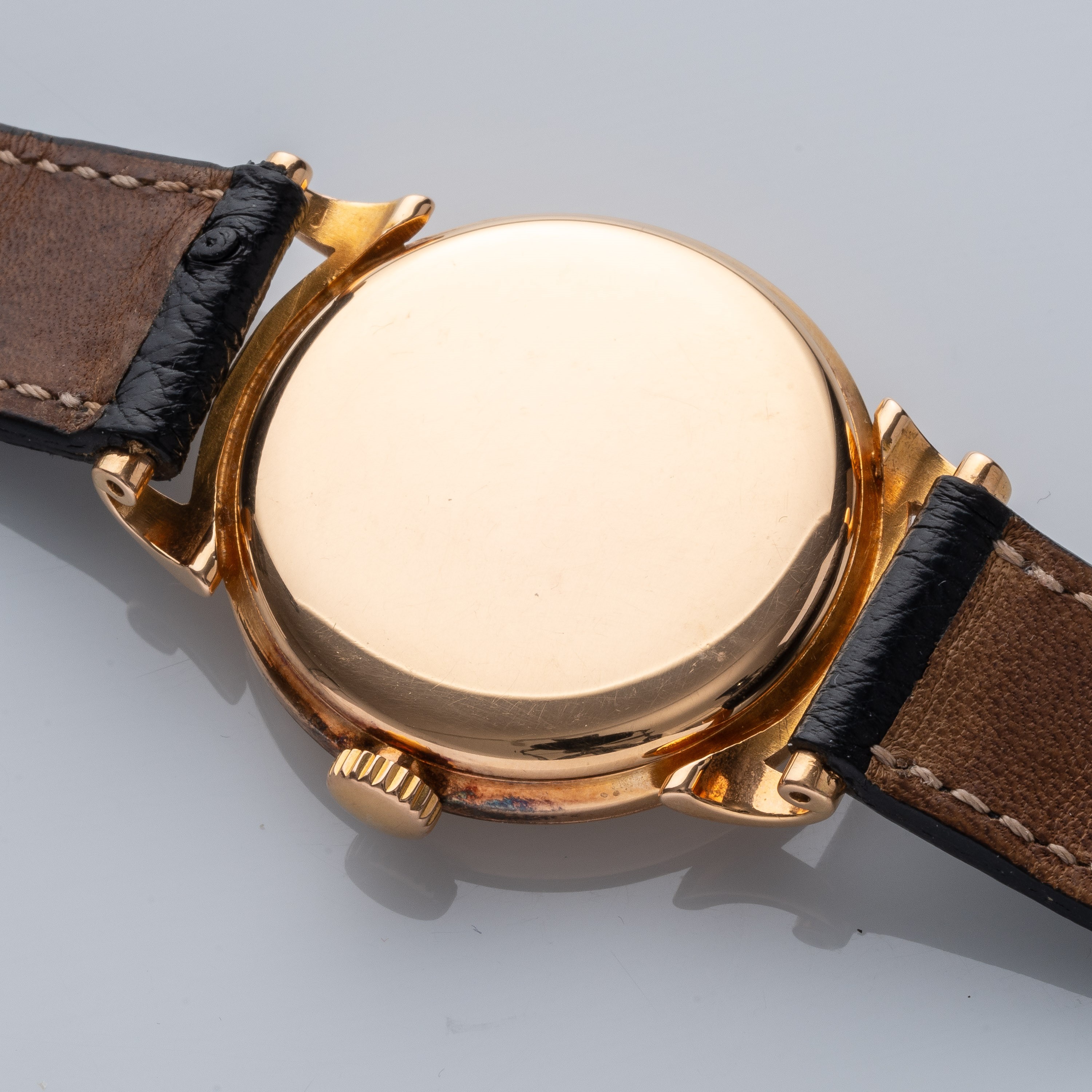 PATEK PHILIPPE - CALATRAVAOROLOGIO A CARICA MANUALE IN ORO ROSA 18KT CON ANSE A RICCIOLO.