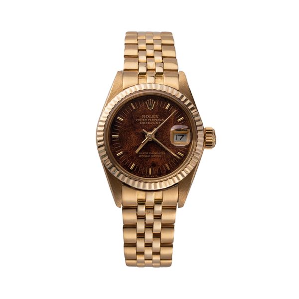 ROLEX - ROLEX - DATEJUST OROLOGIO DA DONNA A CARICA AUTOMATICA IN ORO GIALLO 18KT CON QUADRANTE IN RADICA.