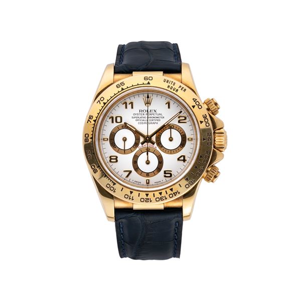 ROLEX - ROLEX - DAYTONA CRONOGRAFO A CARICA AUTOMATICA IN ORO GIALLO 18KT CON QUADRANTE BIANCO.