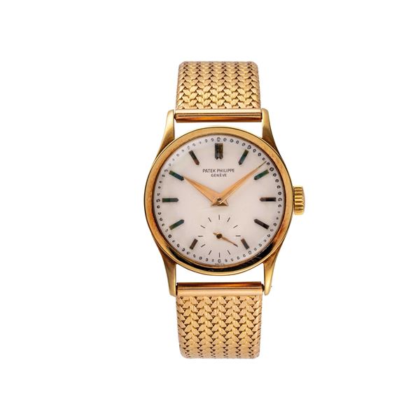 PATEK PHILIPPE - PATEK PHILIPPE - CALATRAVA OROLOGIO SOLO TEMPO A CARICA MANUALE IN ORO GIALLO 18KT CON PICCOLI SECONDI AD ORE SEI E BRACCIALE IN ORO.