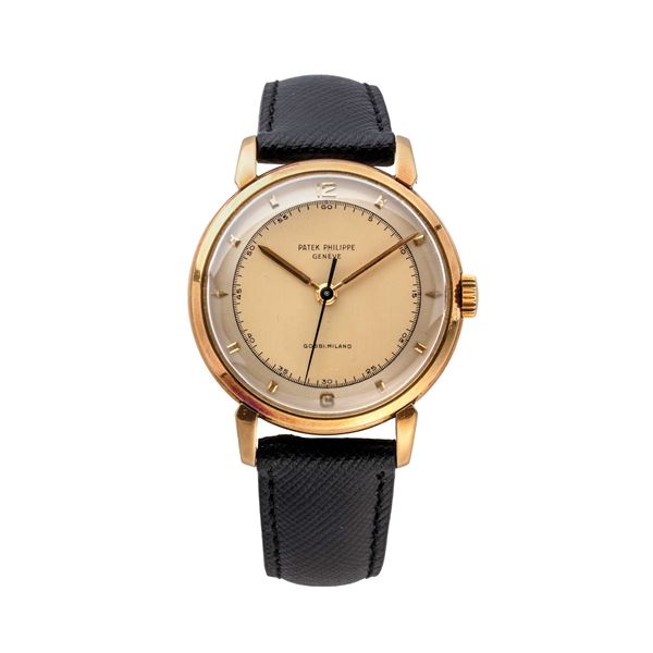 PATEK PHILIPPE - PATEK PHILIPPE - CALATRAVA OROLOGIO SOLO TEMPO IN ORO 18KT CON ANSE DI FORMA A CARICA MANUALE E QUADRANTE BITONALE.