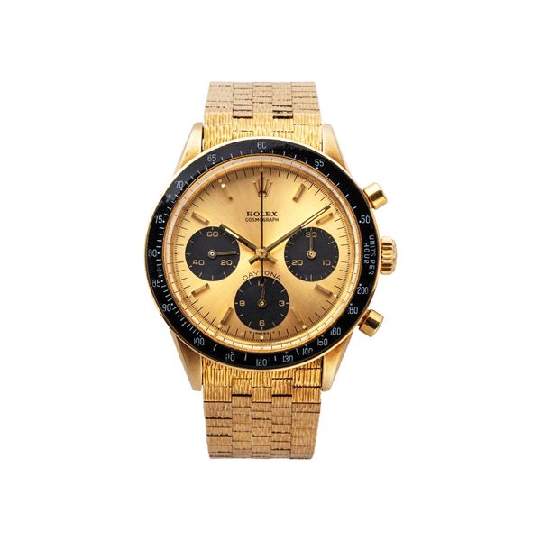 ROLEX - DAYTONA CRONOGRAFO MANUALE IN ORO GIALLO 14KT CON BRACCIALE ROLEX IN ORO 18KT A CORTECCIA.