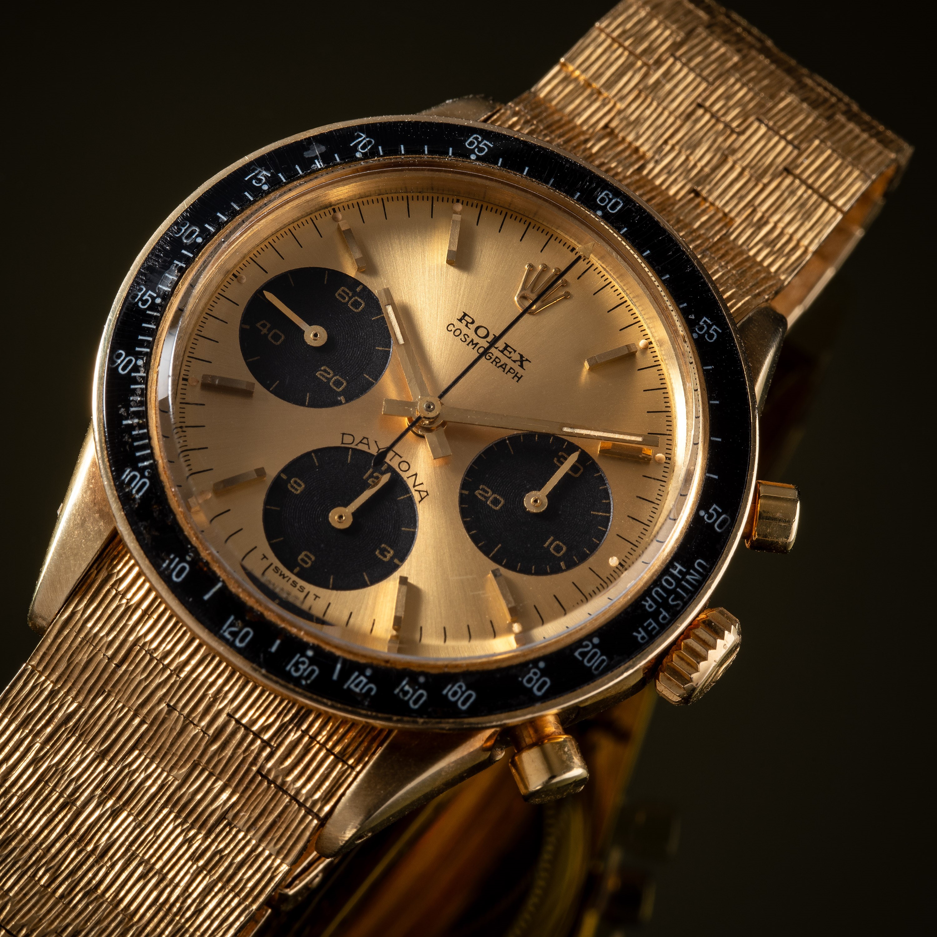 ROLEX - DAYTONACRONOGRAFO MANUALE IN ORO GIALLO 14KT CON BRACCIALE ROLEX IN ORO 18KT A CORTECCIA.