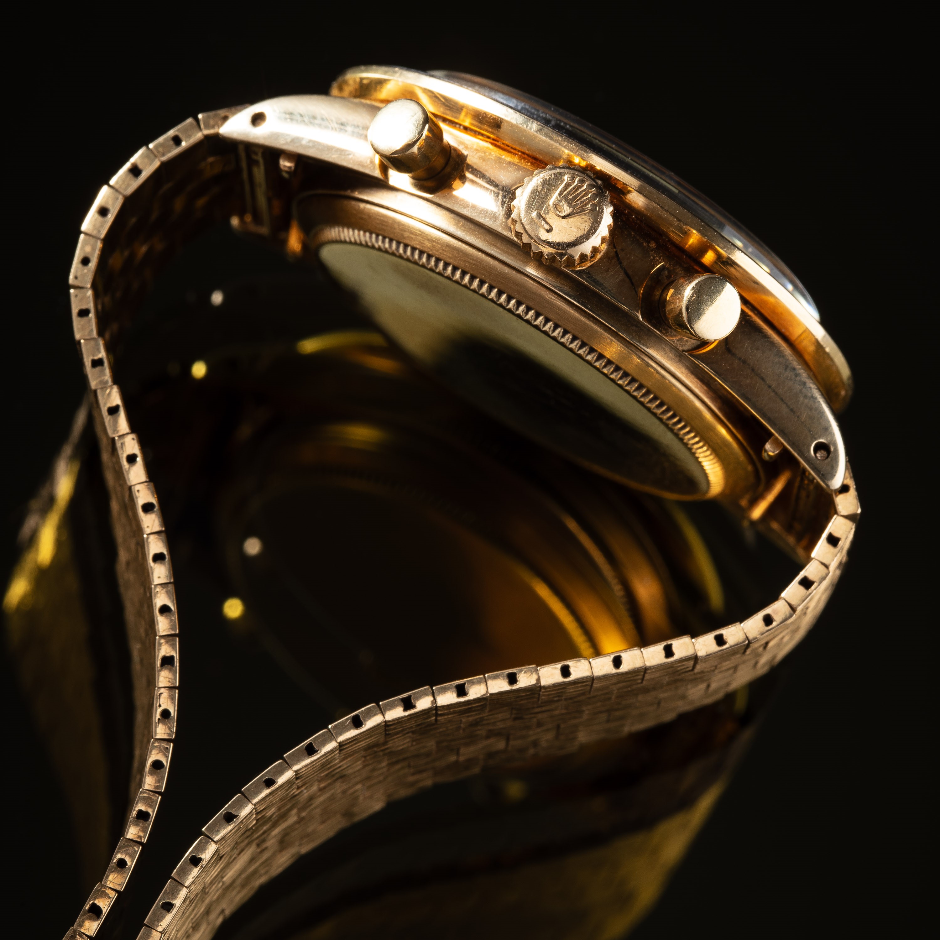 ROLEX - DAYTONACRONOGRAFO MANUALE IN ORO GIALLO 14KT CON BRACCIALE ROLEX IN ORO 18KT A CORTECCIA.