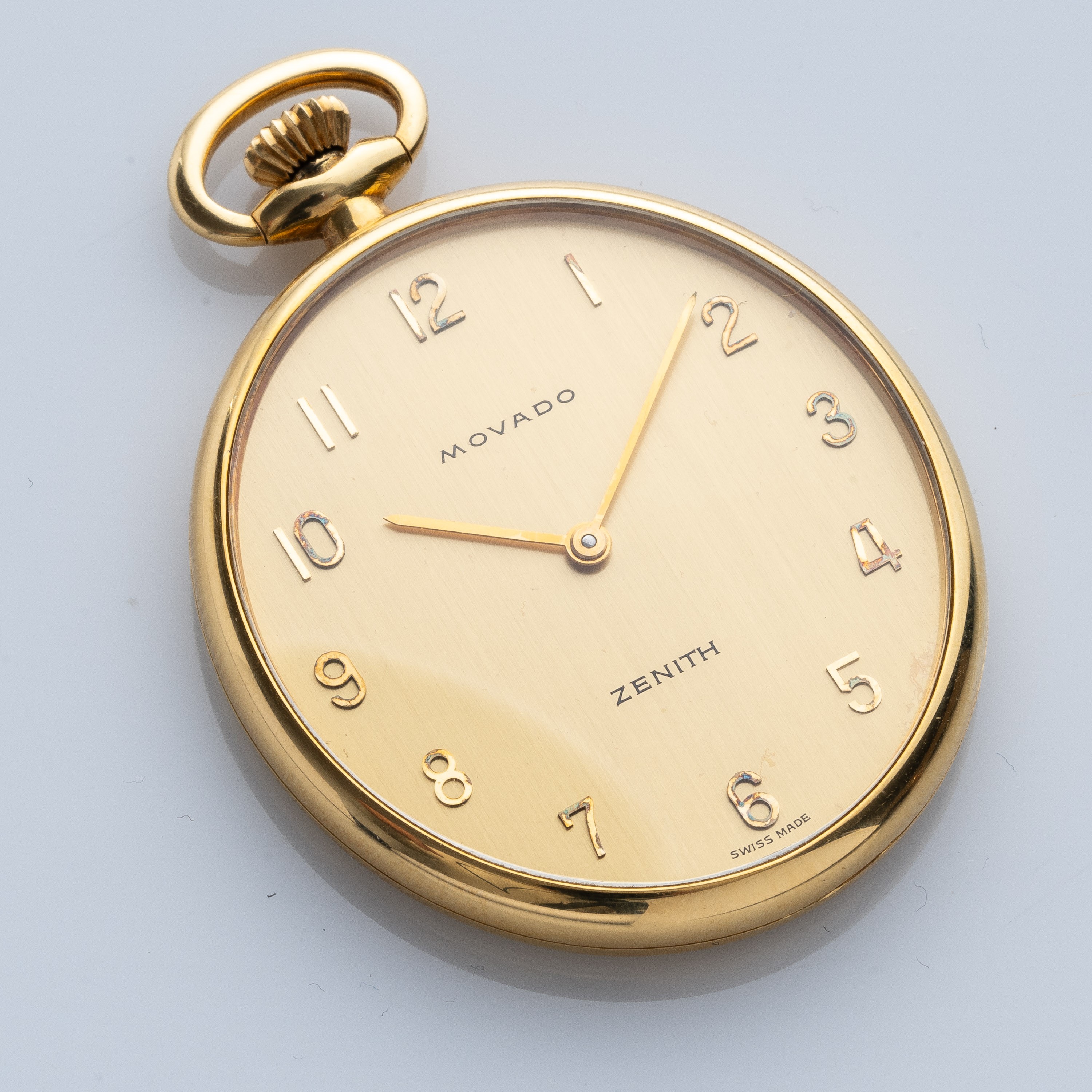 MOVADO ZENITH - OROLOGIO DA TASCA A CARICA MANUALE IN ORO GIALLO 18 KT CON CASSA OVALE.