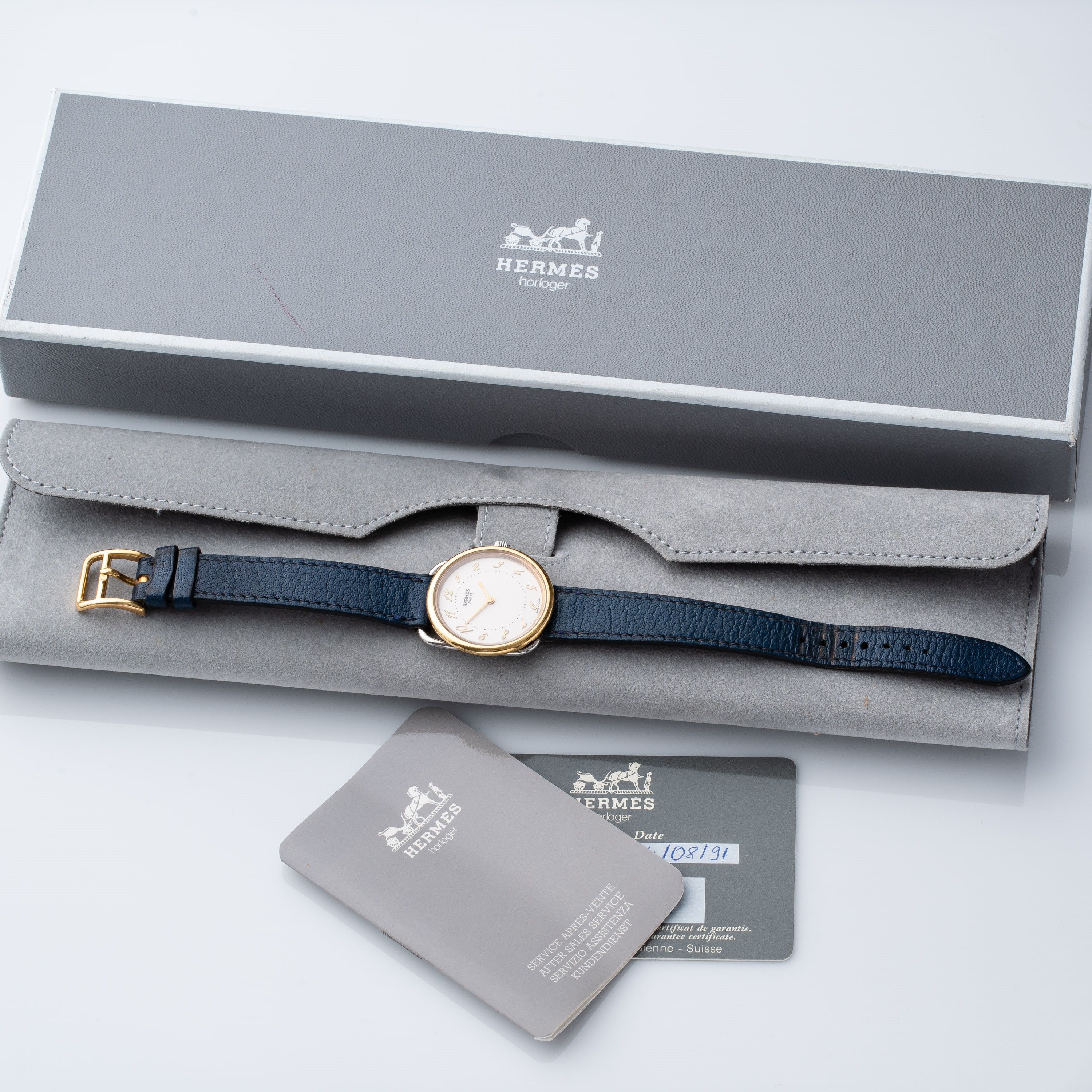 HERMES - ARCEAUOROLOGIO DA DONNA SOLO TEMPO IN ACCIAIO CON GHIERA IN ORO 18KT.
