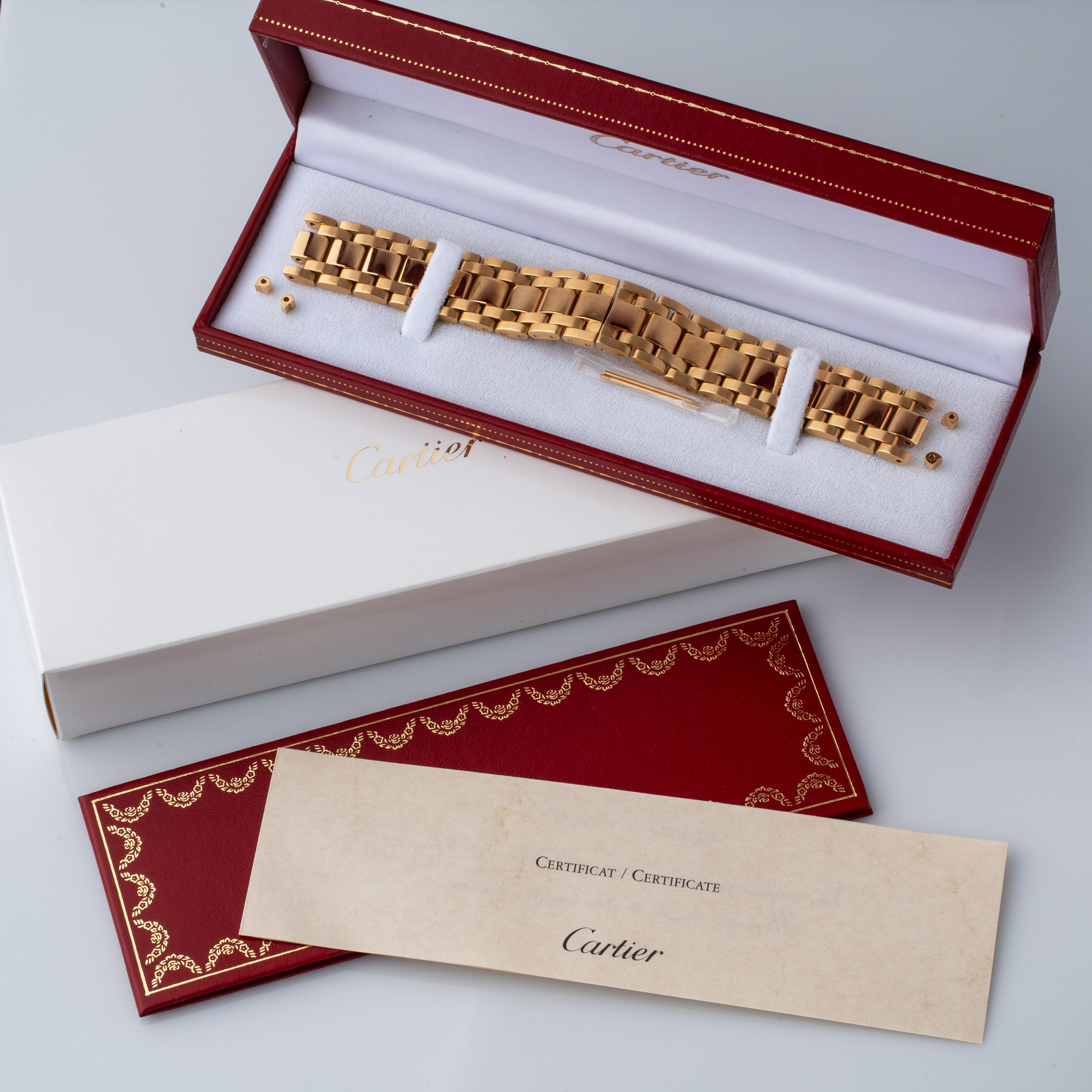 CARTIER - BRACCIALE A 'FERROVIA' PER TANK AMERICAINE IN ORO 18KT.
