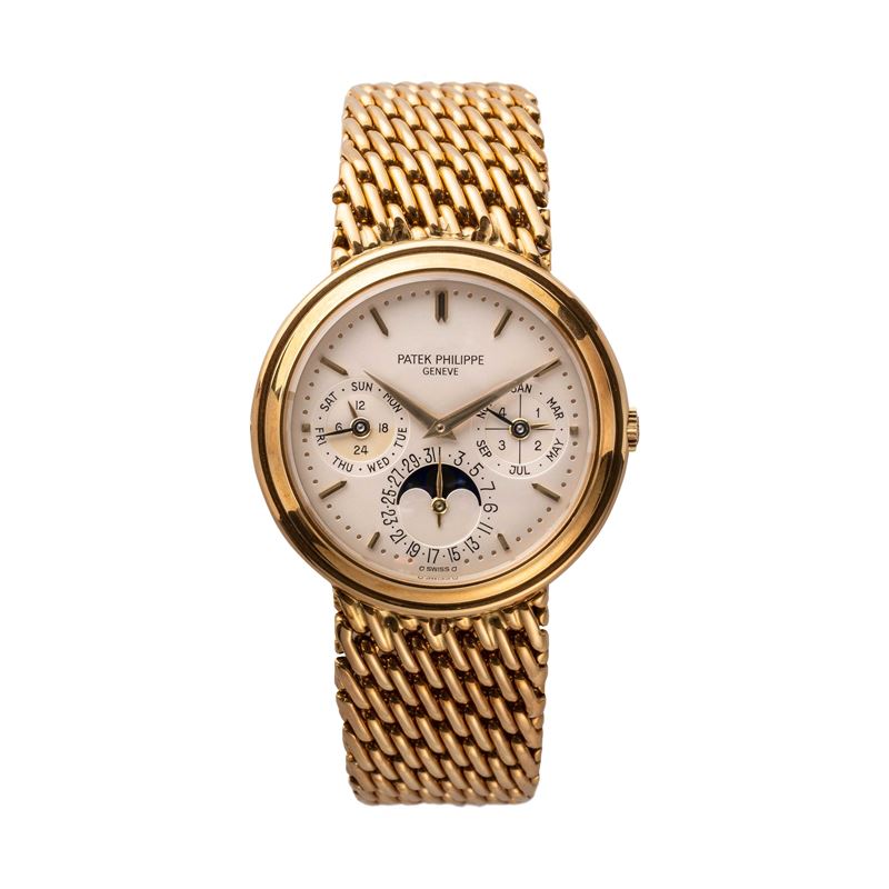 PATEK PHILIPPE - CALENDARIO PERPETUOOROLOGIO A CARICA AUTOMATICA IN ORO GIALLO 18KT CON BRACCIALE...