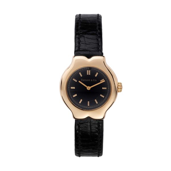 TIFFANY &amp; CO : TIFFANY & CO - TESORO OROLOGIO DA DONNA SOLO TEMPO AL QUARZO IN ORO GIALLO 18KT CON QUADRANTE NERO.  - Asta THE ONE For passionate only - Spangaro & Co Aste