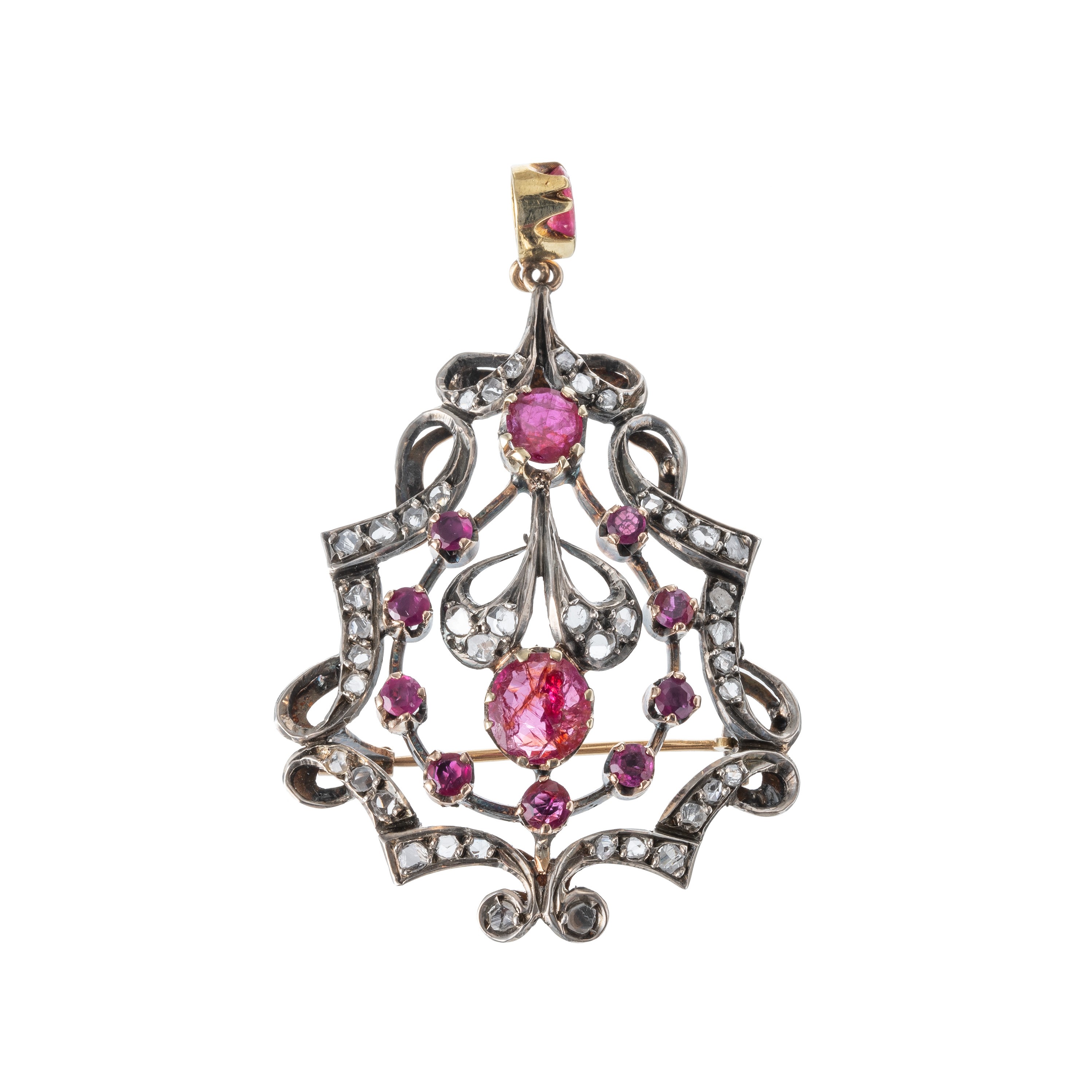 CIONDOLO/SPILLA IN ORO BIANCO 18 KT CON RUBINI E DIAMANTI A ROSETTA RAPPRESENTANTE MOTIVO FLOREAL...