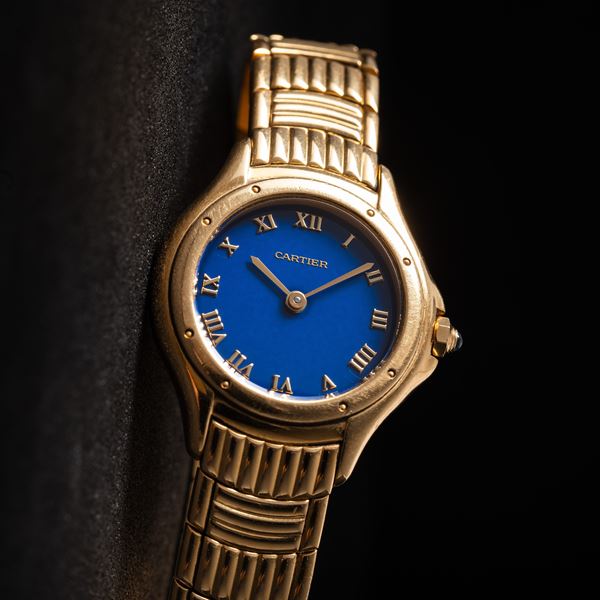 CARTIER - COUGAR OROLOGIO SOLO TEMPO AL QUARZO DA DONNA IN ORO GIALLO 18KT CON QUADRANTE BLU.