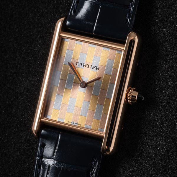 CARTIER - TANK OROLOGIO SOLO TEMPO A CARICA MANUALE IN ORO ROSA 18KT CON QUADRANTE 'TRE ORI'.