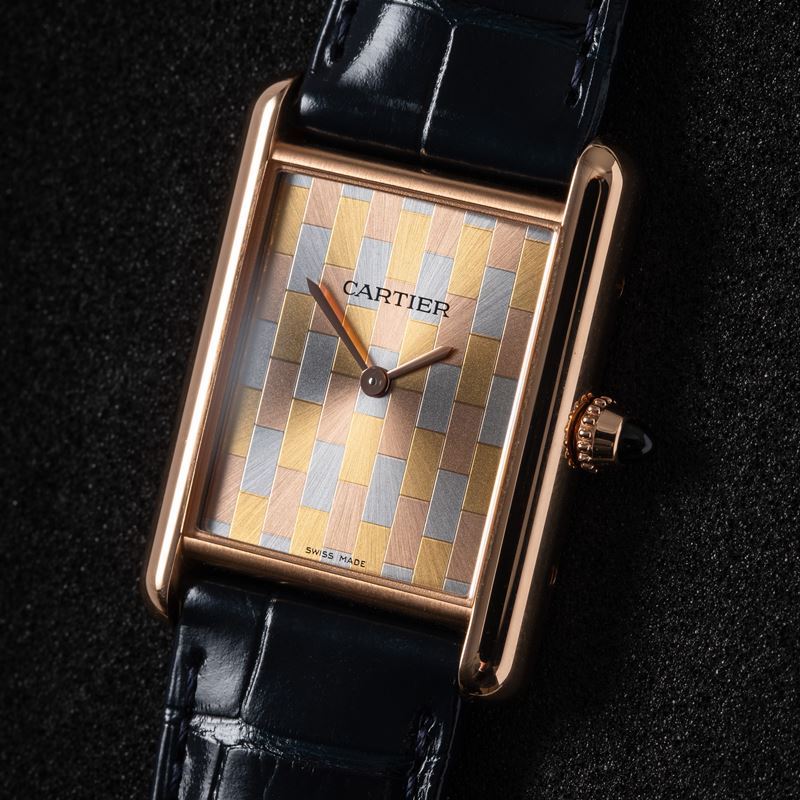 CARTIER - TANKOROLOGIO SOLO TEMPO A CARICA MANUALE IN ORO ROSA 18KT CON QUADRANTE 'TRE ORI'.