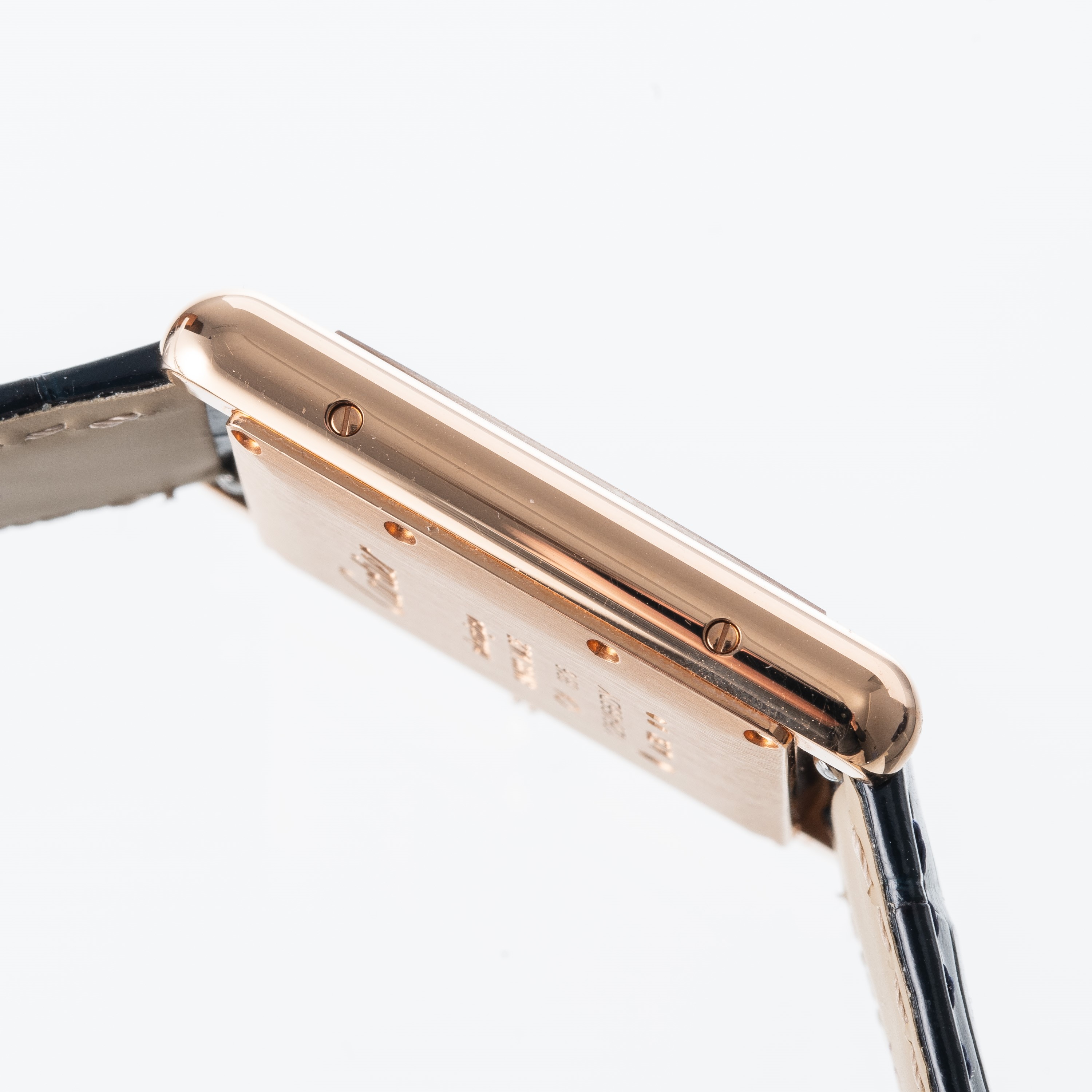 CARTIER - TANKOROLOGIO SOLO TEMPO A CARICA MANUALE IN ORO ROSA 18KT CON QUADRANTE 'TRE ORI'.