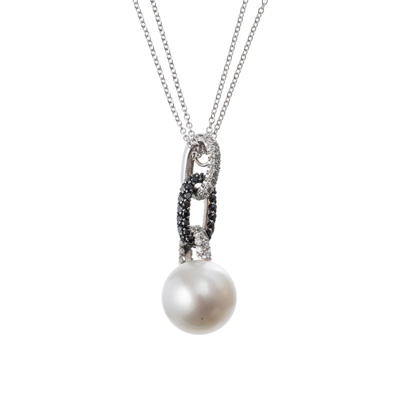 GIROCOLLO IN ORO BIANCO 18 KT CON PERLA COLTIVATA DI MARE