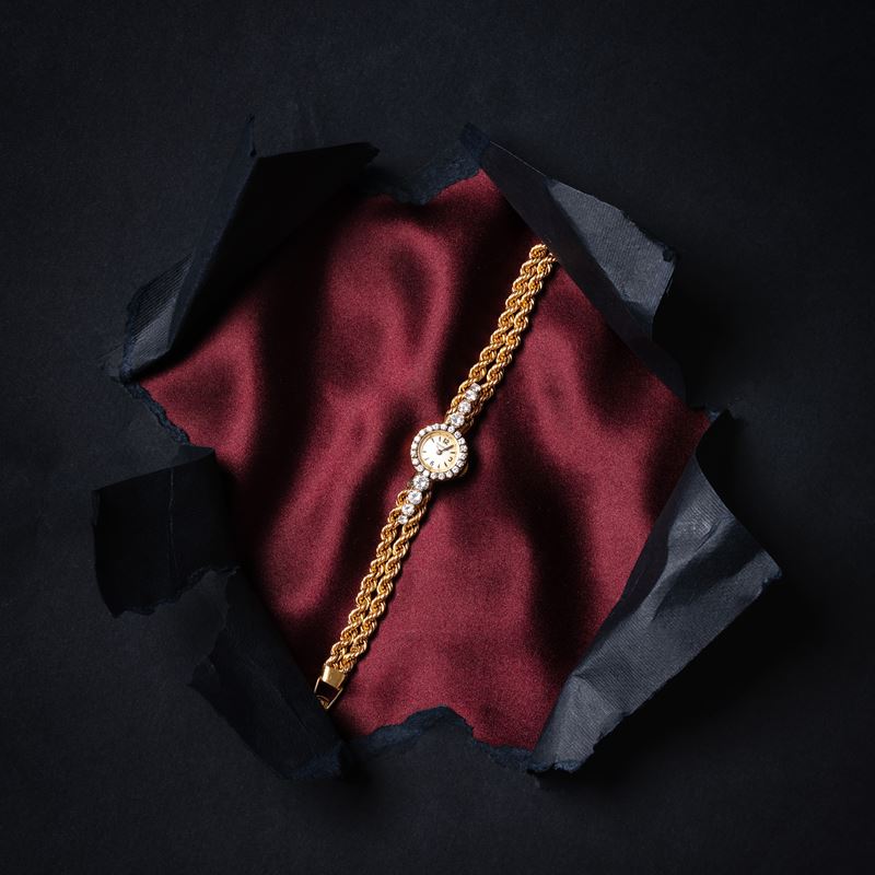 JAEGER LE COULTRE - OROLOGIO GIOIELLO IN ORO GIALLO E DIAMANTI DA DONNA A CARICA MANUALE