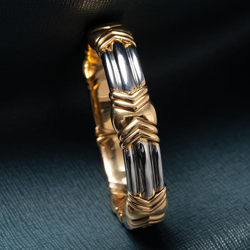 BULGARI - BRACCIALE 'PARENTESI' IN ACCIAIO E ORO GIALLO 18KT