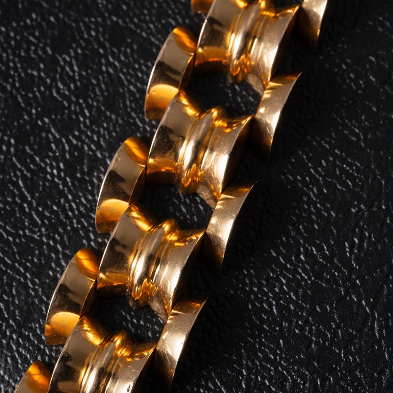 BRACCIALE TANK STAMPATO IN ORO GIALLO 18 KT CON MOTIVI GEOMETRICI CIRCOLARI