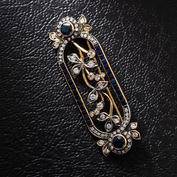 PIOVAN - PIOVAN - SPILLA  SPILLA IN ORO GIALLO 18KT CON ZAFFIRI TONDI CT. 1.90 E CARRE’ PER CT. 1.10 E DIAMANTI  PER CT 0.75 MISURE 53X17 MARCA PIOVAN
