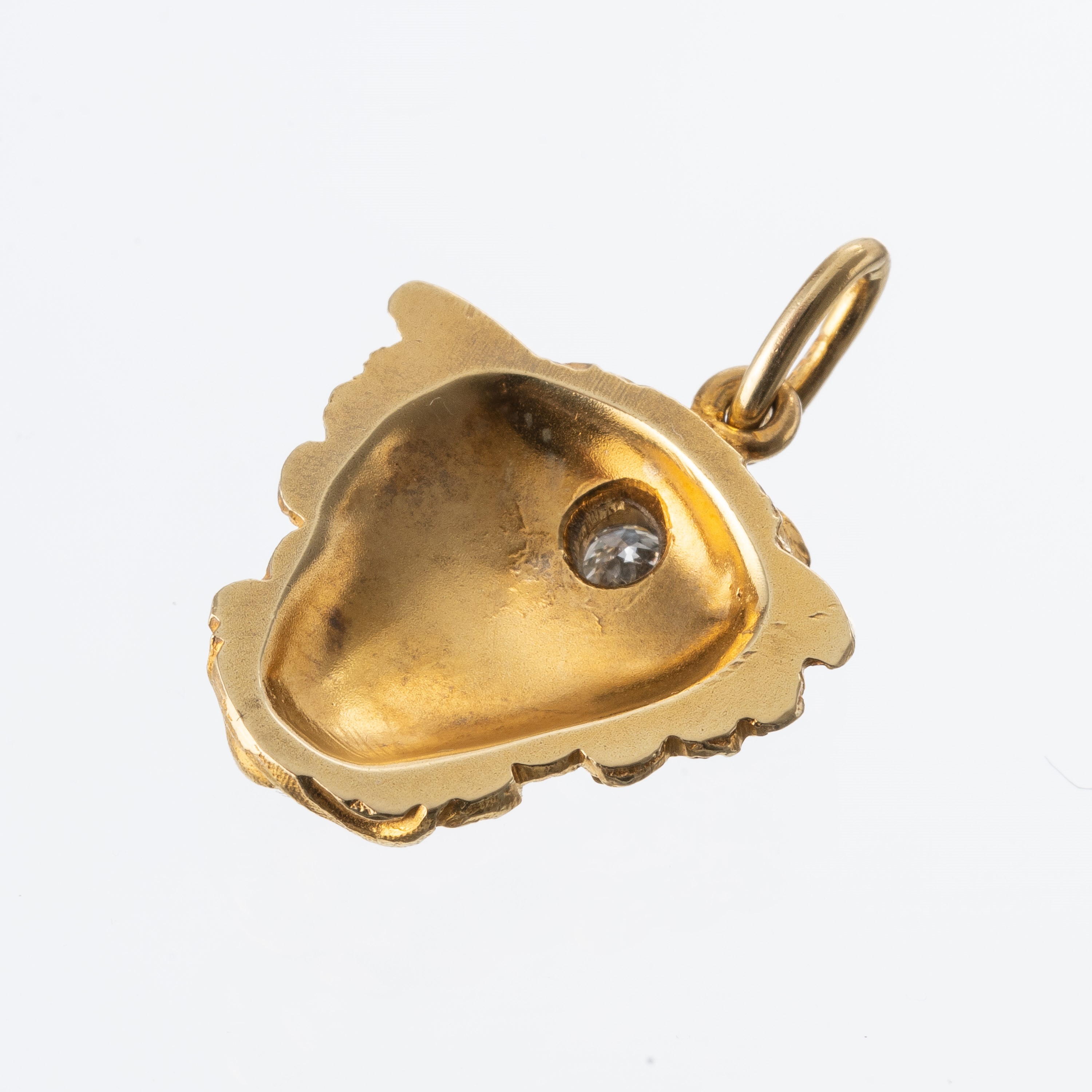 CIONDOLO IN ORO GIALLO 18 KT CON TESTA DI MEDUSA CON INCASTONATO UN DIAMANTE DI CIRCA CT. 0.18