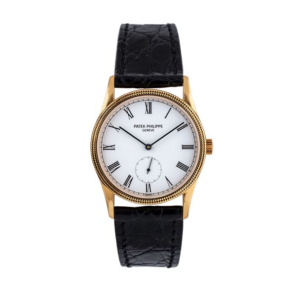 PATEK PHILIPPE - PATEK PHILIPPE - CALATRAVA 18KT YELLOW GOLD MANUAL WINDING WATCH WITH SMALL SIX-HOUR SECONDS, WHITE DIAL AND 'CLOU DE PARIS' CHROME