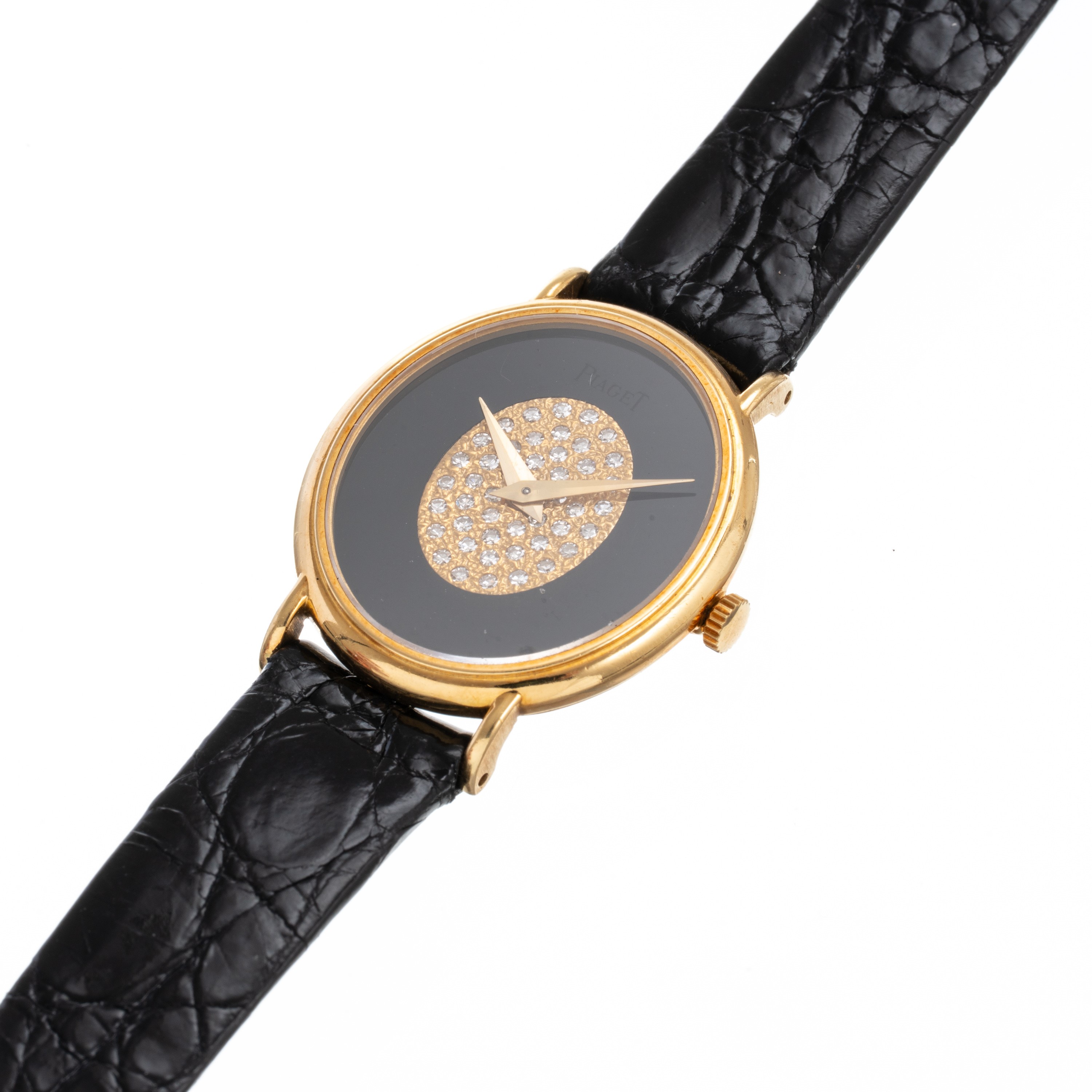 PIAGETOROLOGIO DA POLSO A CARICA MANUALE IN ORO GIALLO 18KT CON QUADRANTE IN ONICE E BRILLANTI