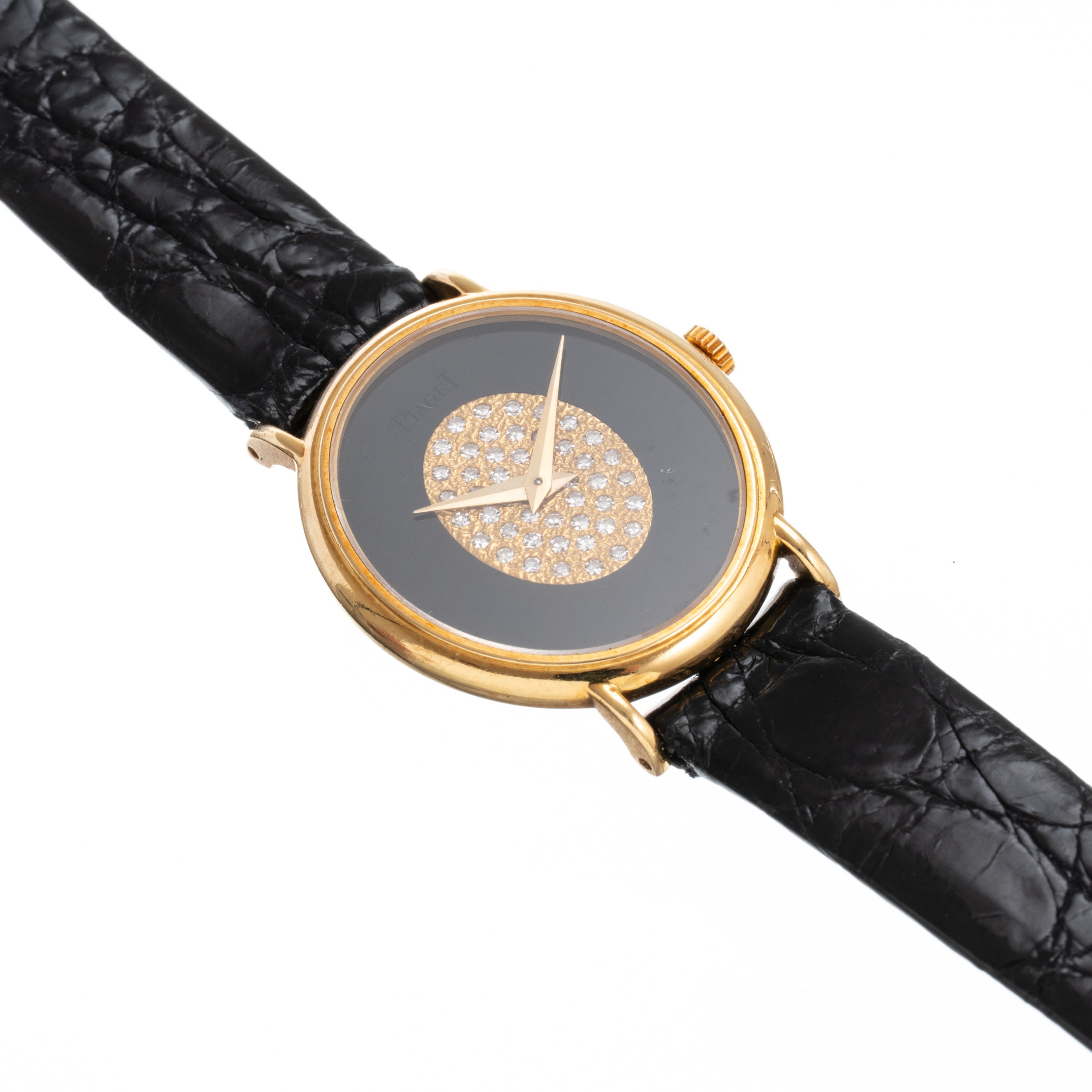 PIAGETOROLOGIO DA POLSO A CARICA MANUALE IN ORO GIALLO 18KT CON QUADRANTE IN ONICE E BRILLANTI