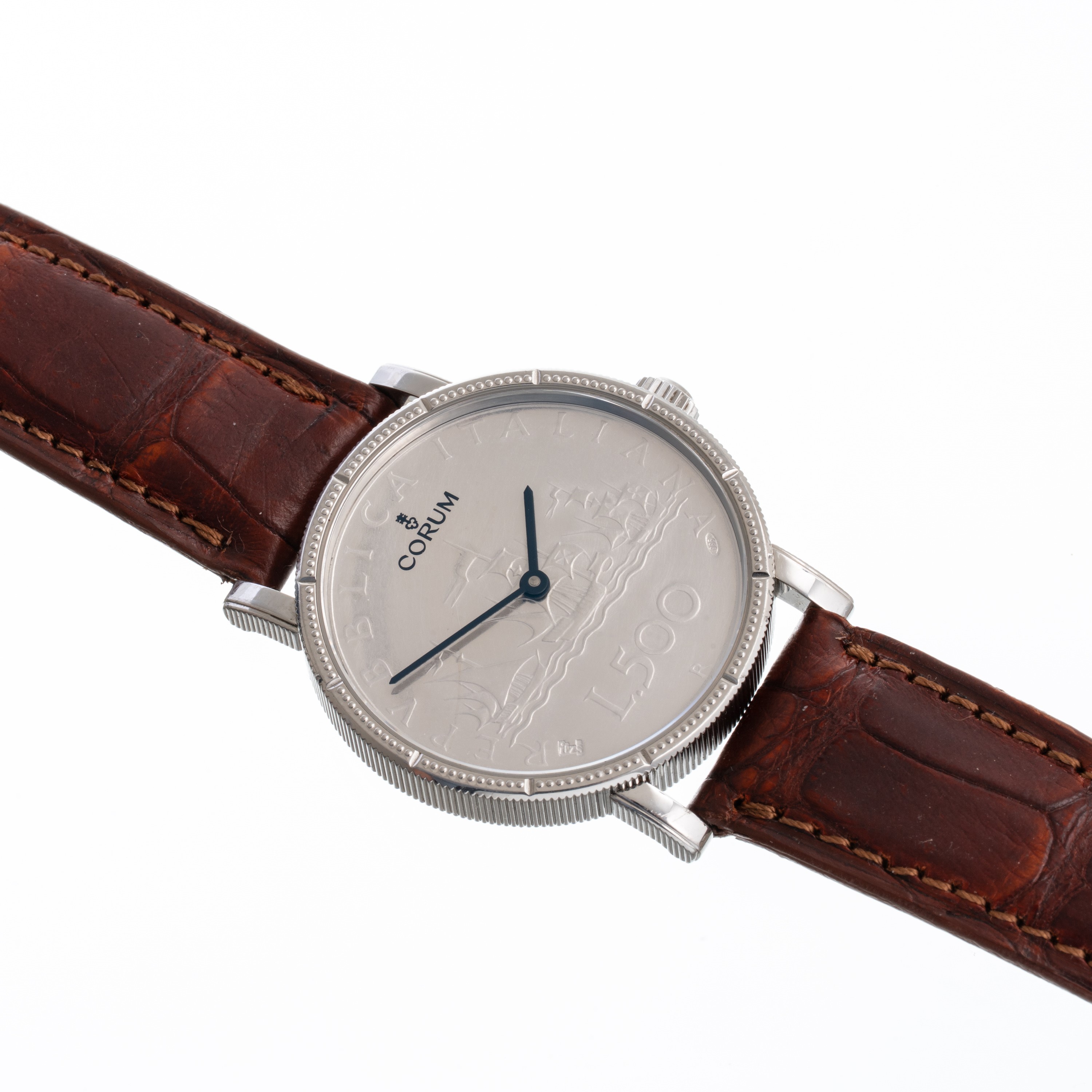 CORUM - 500 LIREOROLOGIO SOLO TEMPO A CARICA AUTOMATICA IN ACCIAIO CON MONETA 500 LIRE IN ARGENTO