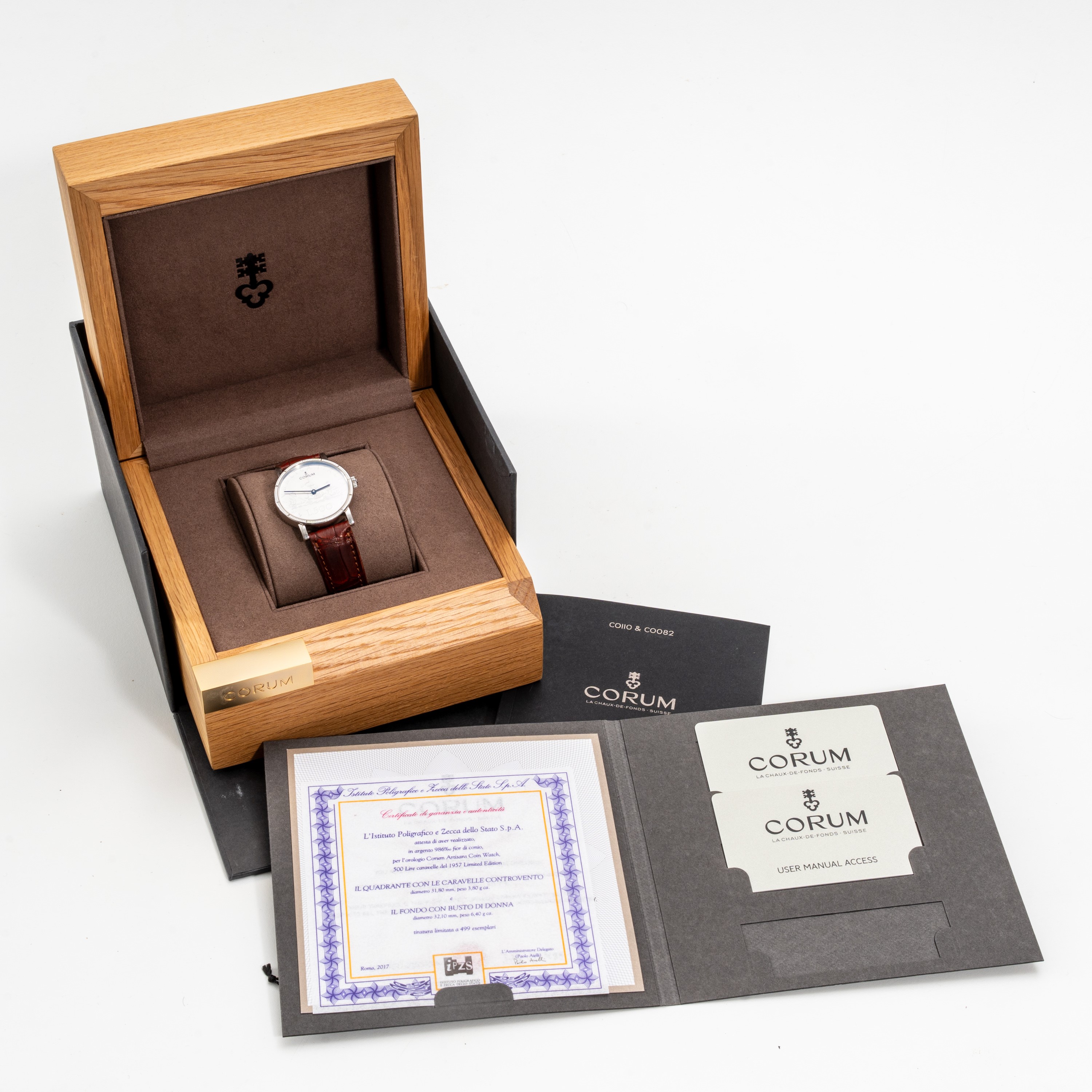 CORUM - 500 LIREOROLOGIO SOLO TEMPO A CARICA AUTOMATICA IN ACCIAIO CON MONETA 500 LIRE IN ARGENTO