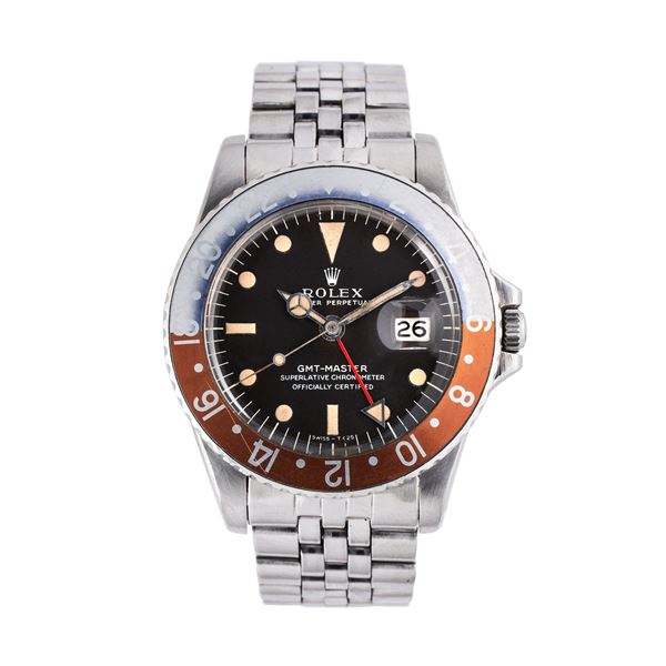 ROLEX - ROLEX - GMT MASTER GMTAUTOMATIC WINDING WATCH WITH 'LONG AND' TROPICAL BROWN DIAL, BIDIRECTIONAL ROTATING DIAL AND THREE-HOUR DATE DISPLAY.