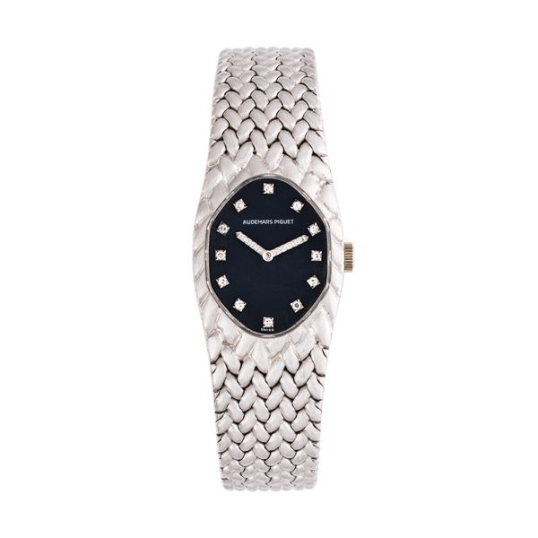 AUDEMARS PIGUET - AUDEMARS PIGUET - MINI COBRA MANUAL WINDING WATCH IN 18KT WHITE GOLD WITH BRACELET INTEGRATED IN 18KT WHITE GOLD, BLACK DIAL WITH INDICES AND DIAMOND SPHERES BRILLIANT CUT