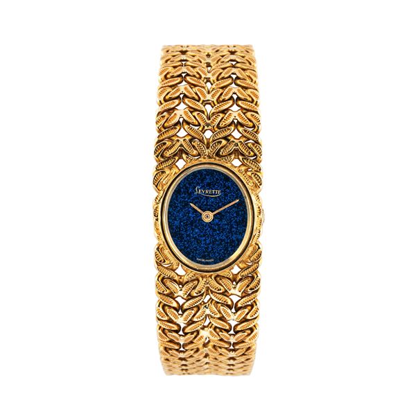 LEVRETTE - LEVRETTE MANUAL WINDING WATCH IN YELLOW GOLD 18KT WITH BRACELET IN YELLOW GOLD 18KT AND BLUE LACQUERED DIAL