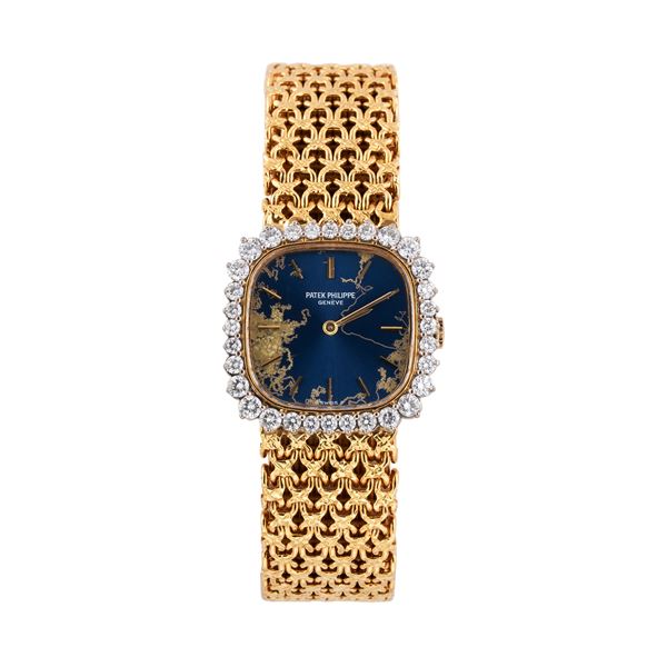 PATEK PHILIPPE - PATEK PHILIPPE MANUAL WINDING WATCH IN YELLOW GOLD 18KT WITHBLUE DIAL AND DIAMOND BEZEL , BRACELET INTEGRATED IN YELLOW GOLD 18KT ENGRAVED