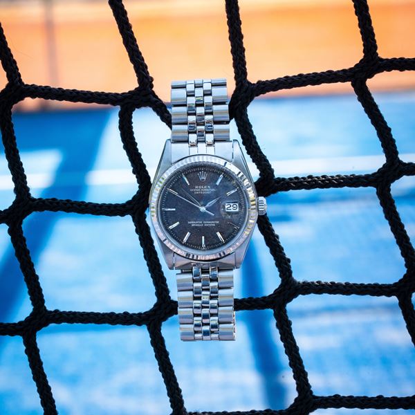 ROLEX - ROLEX - DATEJUST AUTOMATIC WINDING STEEL WATCH WITH THREE-HOUR DATE, TROPICAL GOLD GRAPHIC DIAL AND JUBILEE BRACELET.