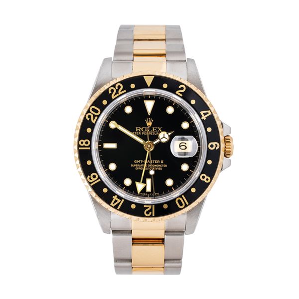 ROLEX - ROLEX - GMT MASTER II GMT WATCH WITH AUTOMATIC WINDING IN STEEL AND YELLOW GOLD 18KT WITH BLACK DIAL, BLACK DIAL AND DATE DISPLAY THREE HOURS