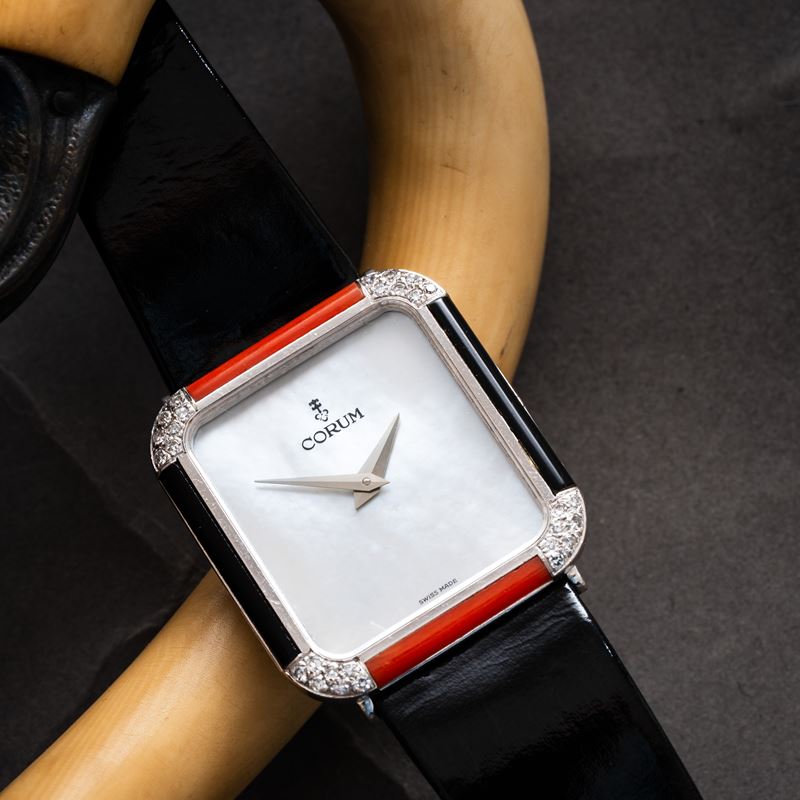 CORUM - TANKOROLOGIO SOLO TEMPO A CARICA MANUALE IN ORO BIANCO 18KT CON QUADRANTE MADREPERLA, GHI...