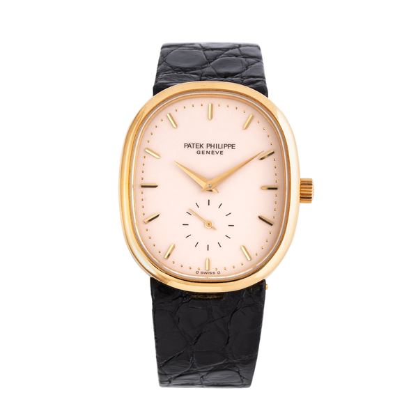 PATEK PHILIPPE - PATEK PHILIPPE - ELLIPSE MANUAL WINDING 18KT YELLOW GOLD WATCH WITH SIGMA 'IVORY' DIAL AND SMALL SECONDS AT SIX O'CLOCK