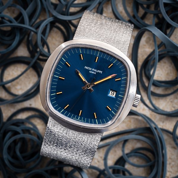 PATEK PHILIPPE - BETA 21 18KT WHITE GOLD QUARTZ WATCH WITH INTEGRATED 18K WHITE GOLD BRACELET AND SIGMA  [..]
