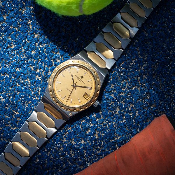 VACHERON CONSTANTIN - VACHERON CONSTANTIN - 222 AUTOMATIC WINDING WATCH IN 18KT YELLOW GOLD AND STEEL WITH CHAMPAGNE DIAL.