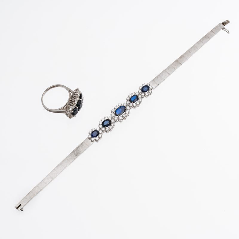 PARURE IN ORO BIANCO 18 KT CON ANELLO E BRACCIALE CON ZAFFIRI E BRILLANTI