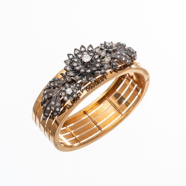 BRACCIALE FRANCESE IN ORO GIALLO 18 KT CON MOTIVI FLOREALI TREMBLANT IN ARGENTO E DIAMANTI